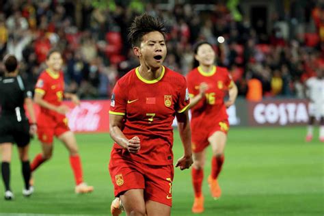 China edges Haiti 1-0 to keep World Cup hopes alive despite going down to 10 players